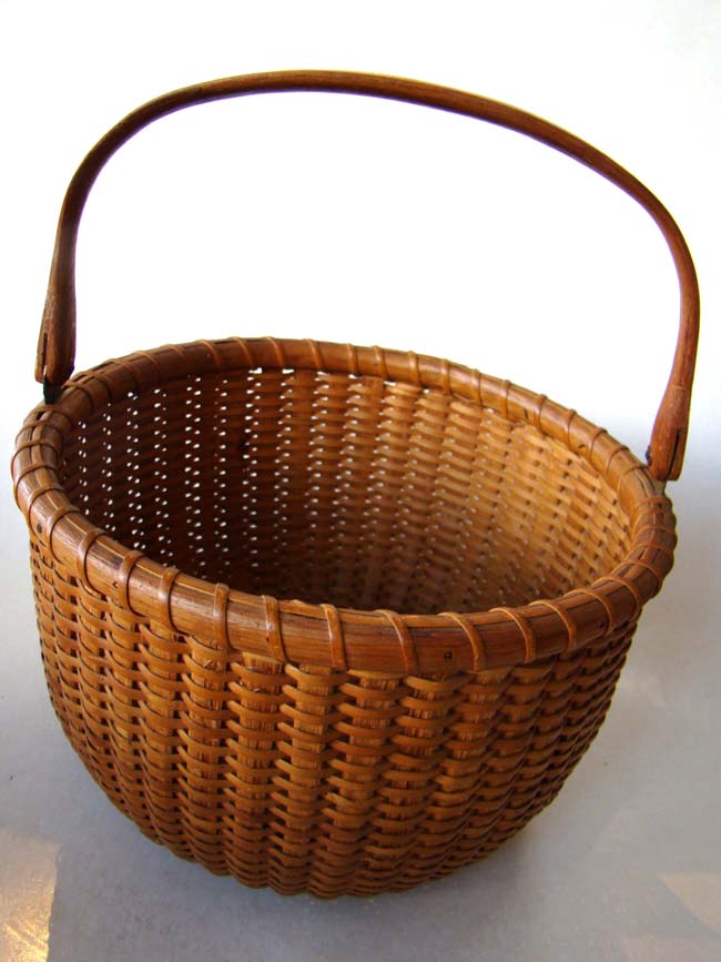 A wonderful Nantucket Lightship Basket "Made by Ferdinand Sylvaro, 97 Orange Street, Nantucket, Mass.", circa 1935 — image 3